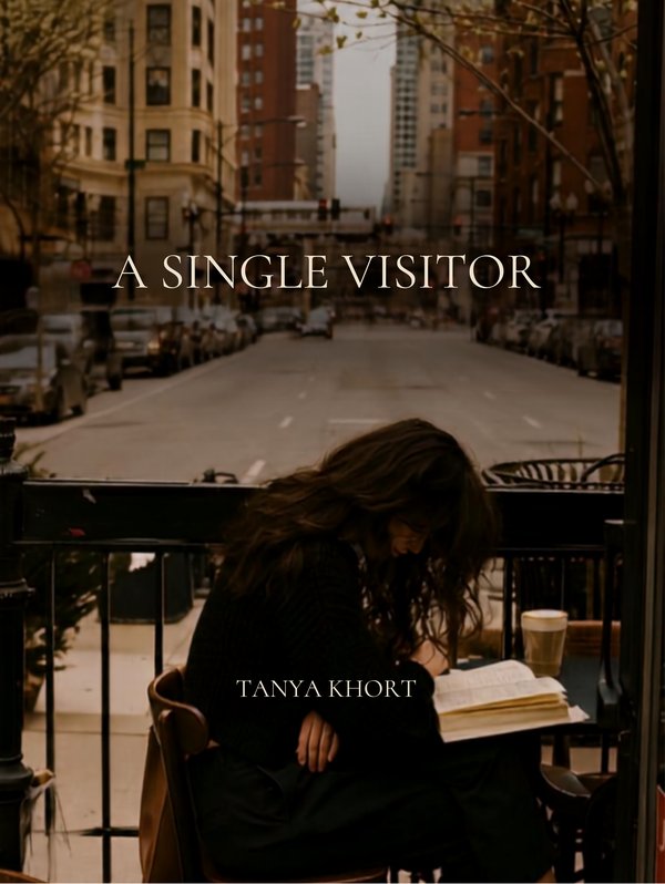 Cover of A Single Visitor by Tanya Khort: a woman seen from behind, seated alone at a cafe table, reading with a coffee beside her, on a quiet Chicago street in soft afternoon light.